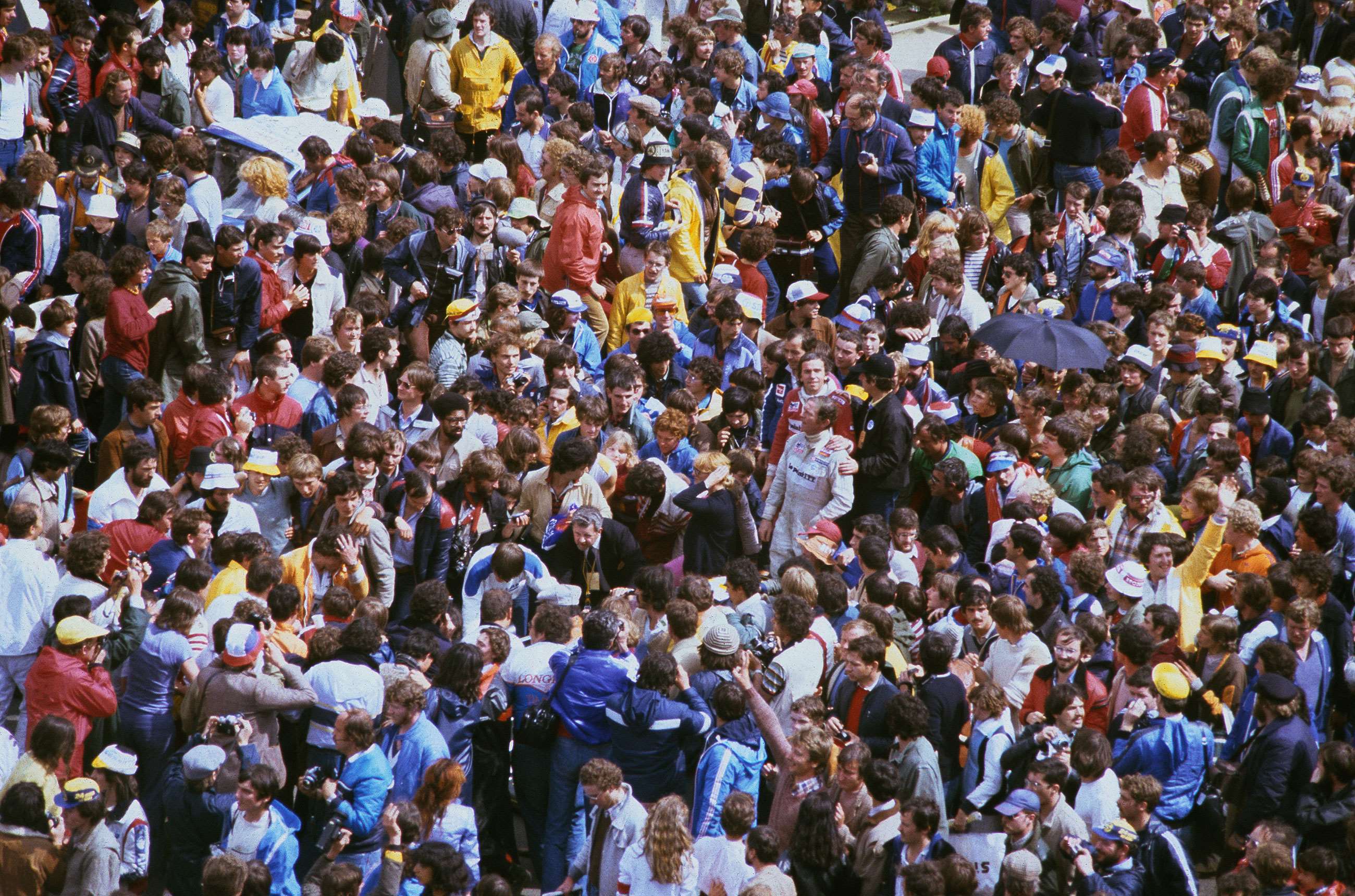Post-race mob, Le Mans, 1980. Spot the winners Jean Rondeau and Jean-Pierre Jaussaud – they're in there somewhere...