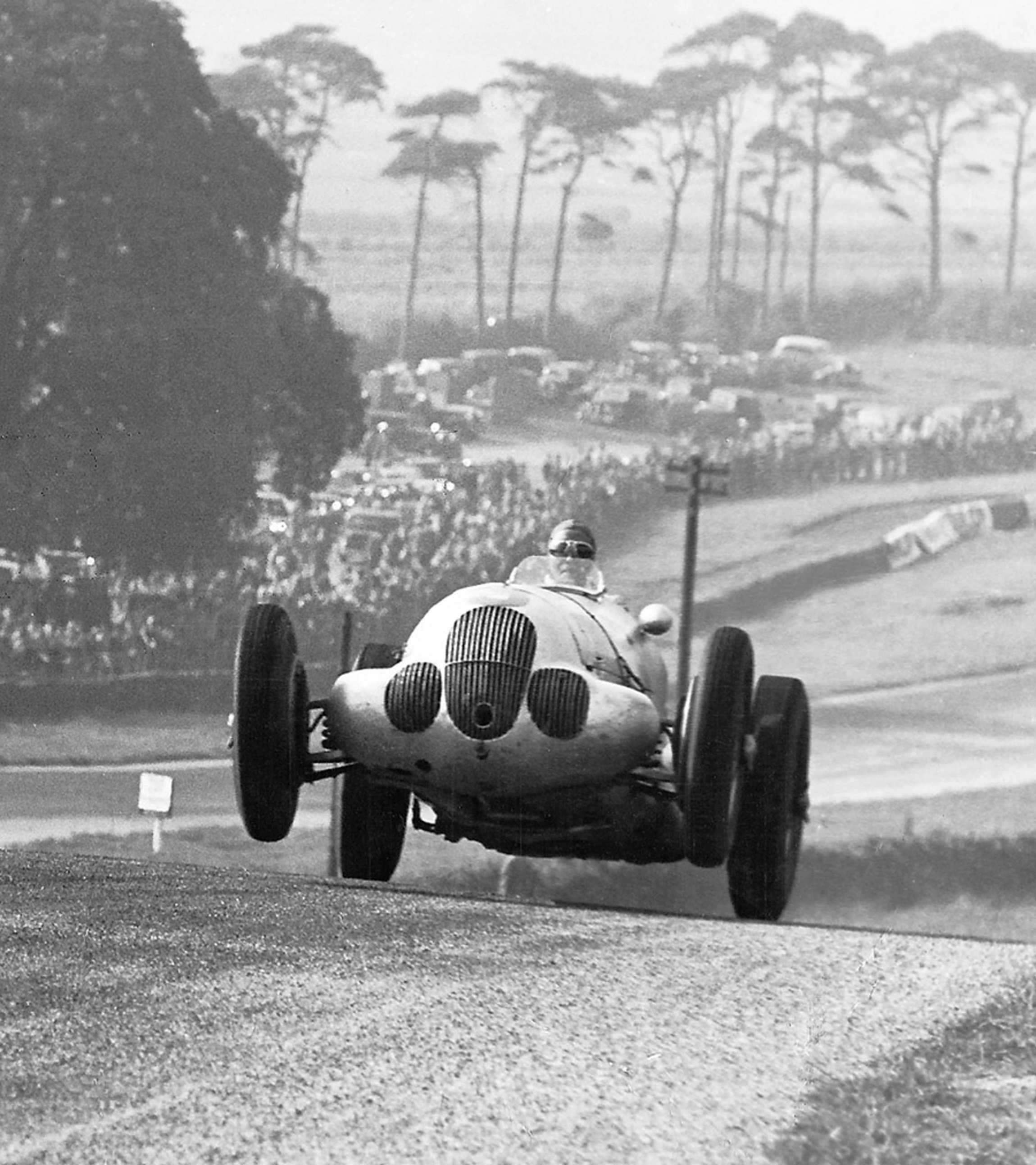 3 - High tide - Manfred von Brauchitsch’s works Mercedes-Benz W125 during the 1937 Donington GP