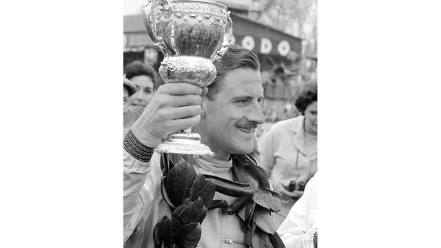 Graham with the coveted Glover Trophy - his first outright Formula 1 race win, Easter Monday 1962