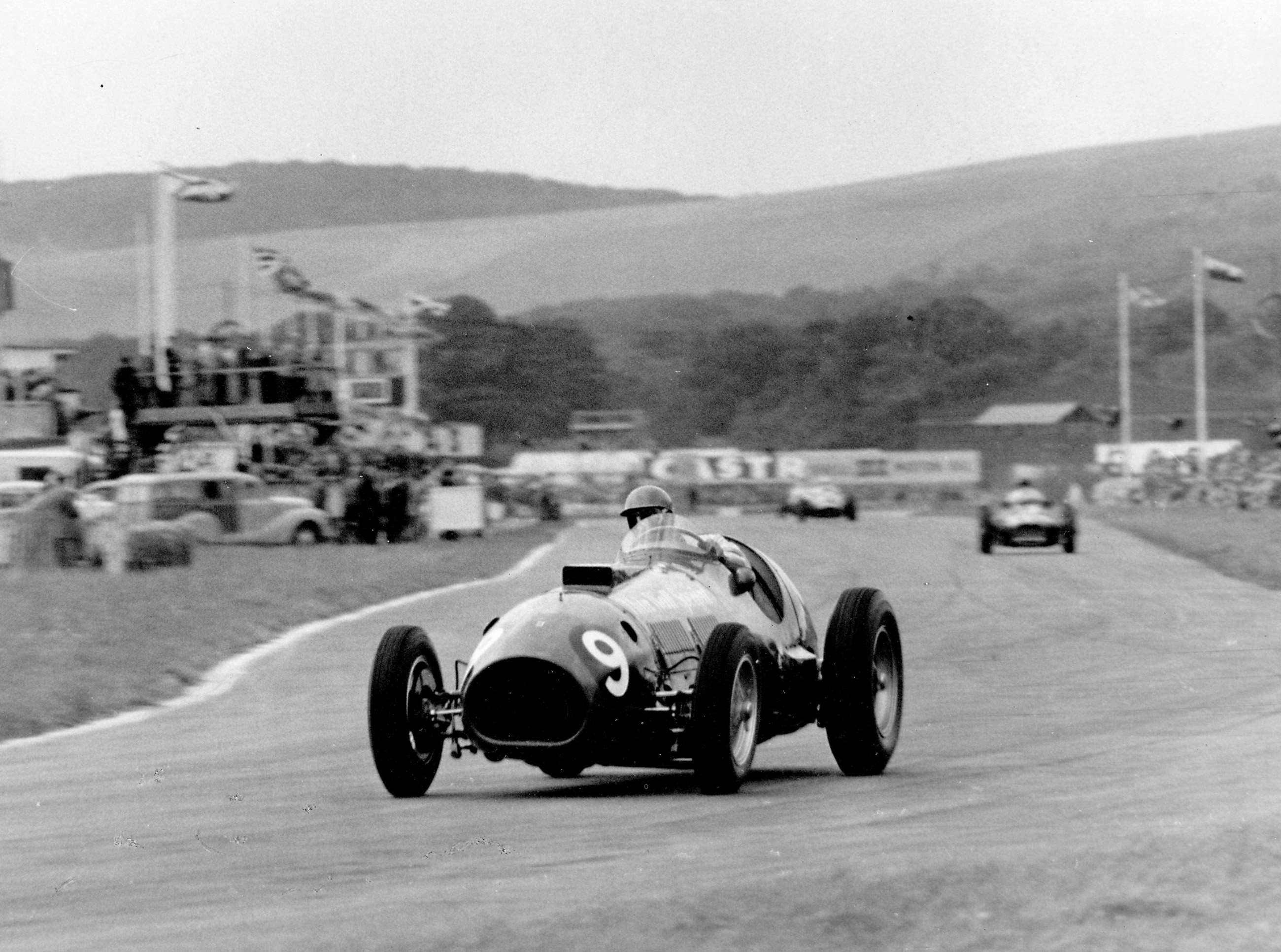 Peter Collins in Tony Vandervell’s majestic 4.5-litre V12 Ferrari ‘ThinWall Special’ - blazing into Madgwick Corner… en route to another fastest race lap…