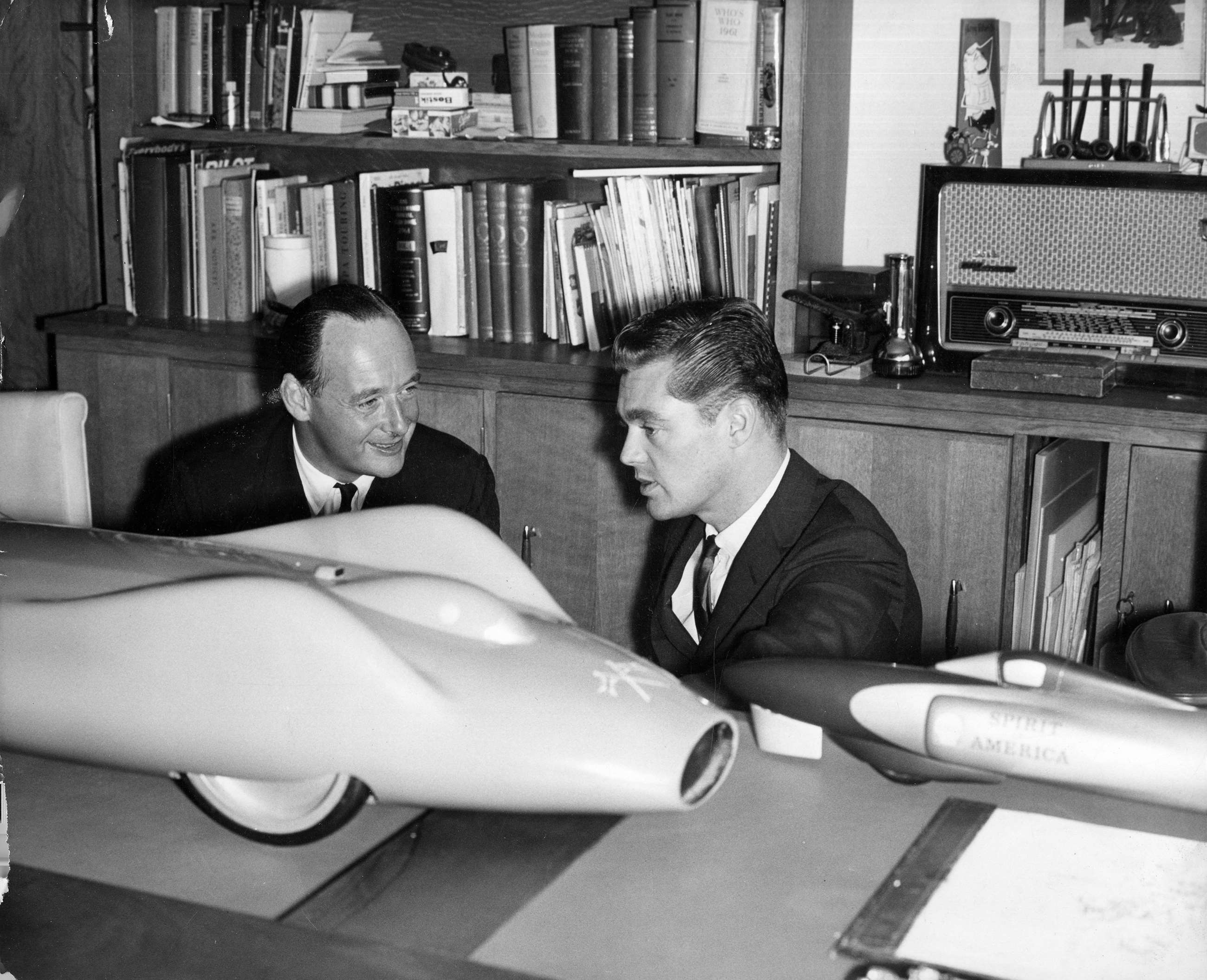 Donald Campbell and American rival Craig Breedlove with models of ‘Bluebird’ CN7 and ’Spirit of America’ at the British hero’s home… Both were gas turbine powered, the ‘Bluebird’ four-wheel wheel-driven, the ’Spirit’s three-wheeler frame driven by jet thrust. 'Bluebird’ cost some £900,000-plus - ’Spirit’ a fraction of that. The British car’s 403.1mph compared to the American’s 526.28mph...