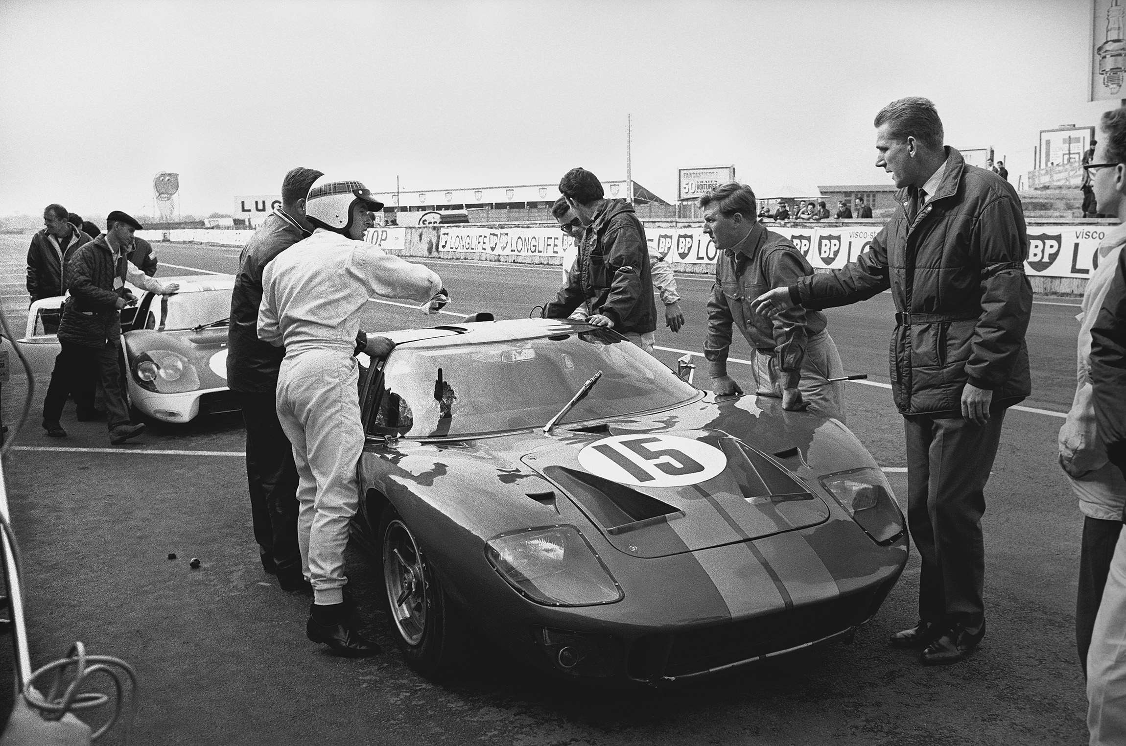 Jackie Stewart/John Whitmore in the pits during Le Mans test day 1966