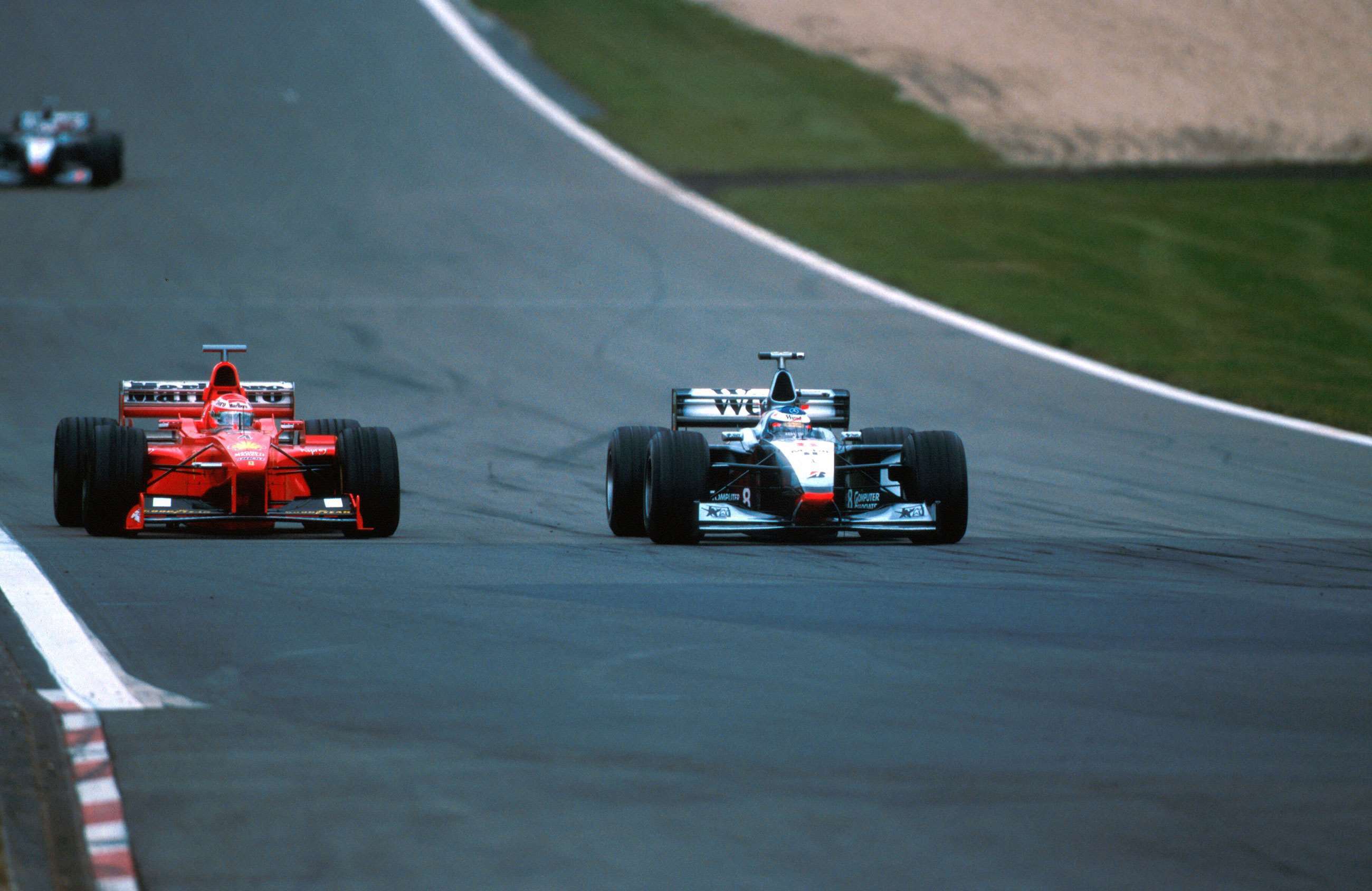 f1-1998-nurburgring-mika-hakkinen-mclaren-mp4-13-eddie-irvine-ferrari-f300-sutton-mi-goodwood-05102020.jpg