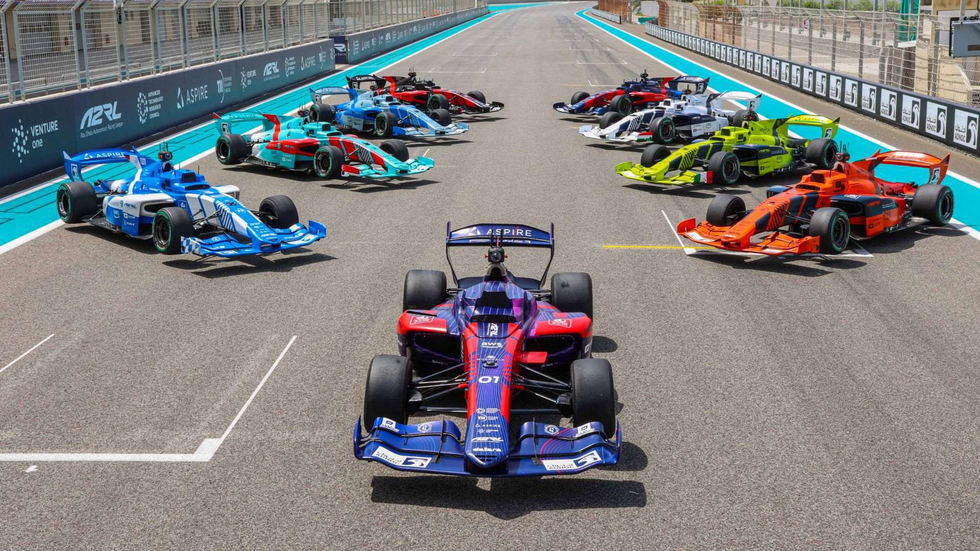 a2rl-grid---8-teams-plus-tii-demonstration-car-for-human-vs-ai-race.jpg
