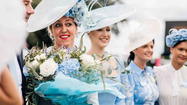 Racegoers dressed in the signature blue and white colours of L’Ormarins for the chance to win a trip-of-a-lifetime to South Africa.